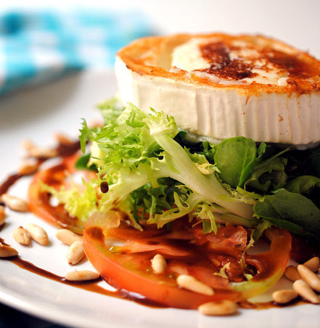 Goat cheese salad with honey, mustard and pistachio dressing