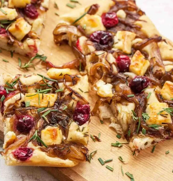 Focaccia with caramelized onions, blueberries and brie cheese