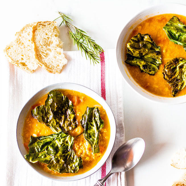 Lentil, tomato and paprika soup with crispy kale